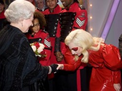 Lady gaga bows to the queen