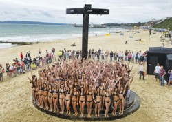 152 people stand under a giant shower at Bournemouth