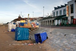 Upturned wheelie bins are the sign that vandals have been to the beach